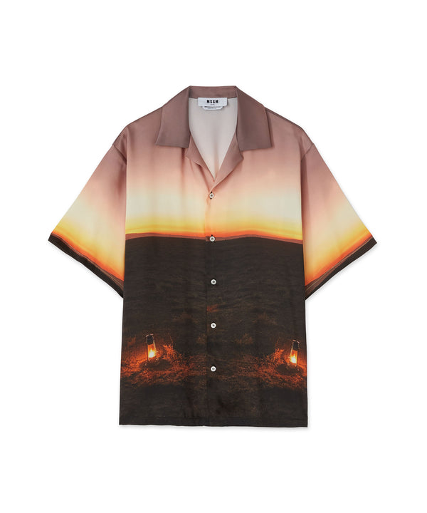 Fluid fabric  bowling shirt with "Tanzanian gaze torch snap" print