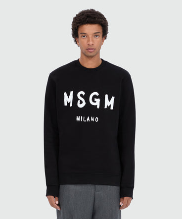 Felpa nera girocollo con logo pennellato