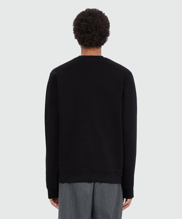 Felpa nera girocollo con logo pennellato