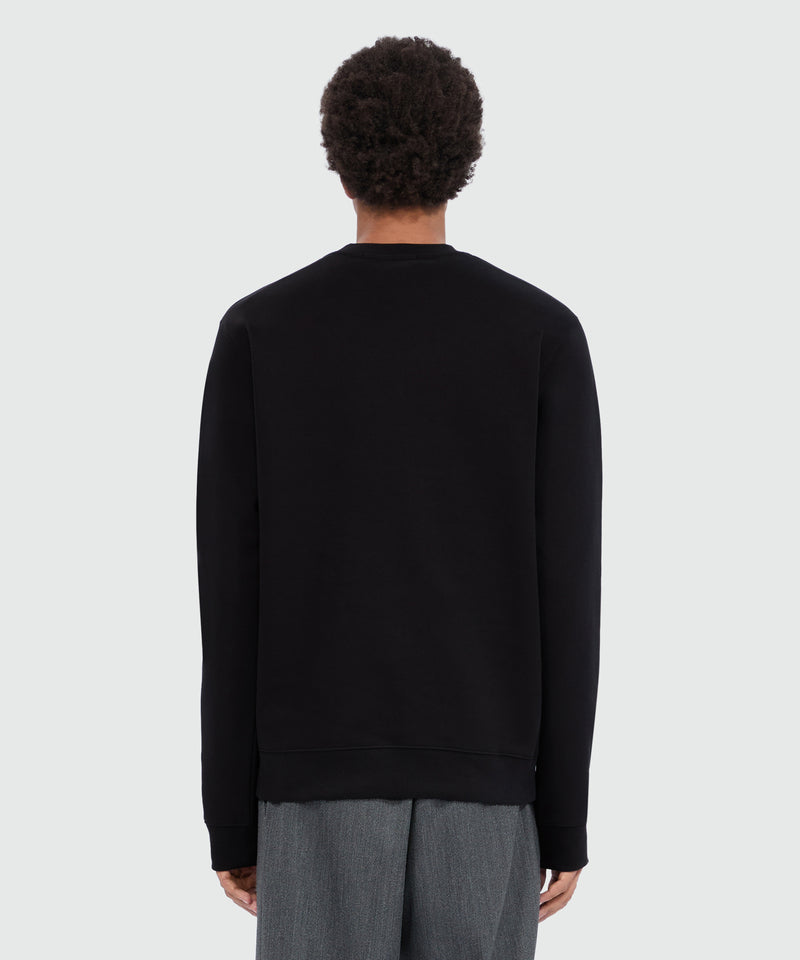 Felpa nera girocollo con logo pennellato 99 Uomo 