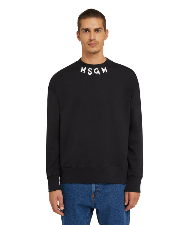 Cotton crewneck sweater wth MSGM brushstroke logo positioned at the neck