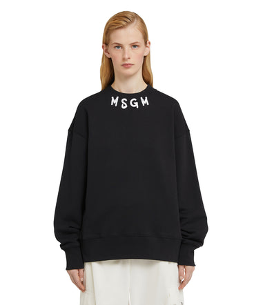 Cotton crewneck sweater wth MSGM brushstroke logo positioned at the neck