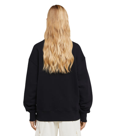 Cotton crewneck sweater wth MSGM brushstroke logo positioned at the neck