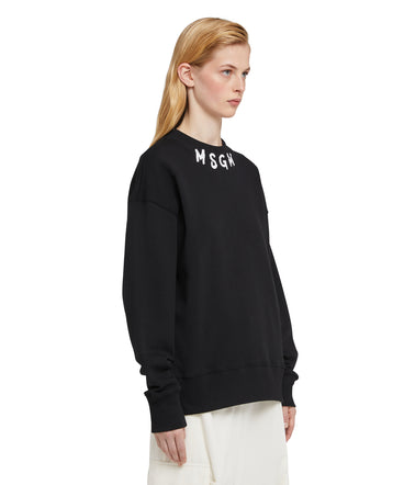 Cotton crewneck sweater wth MSGM brushstroke logo positioned at the neck