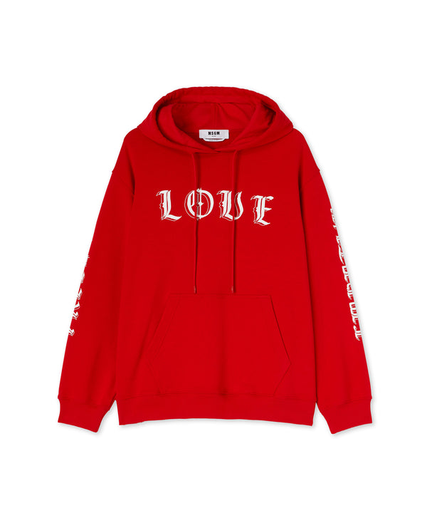 Hooded sweatshit with "Love, Freedom, Empathy" print