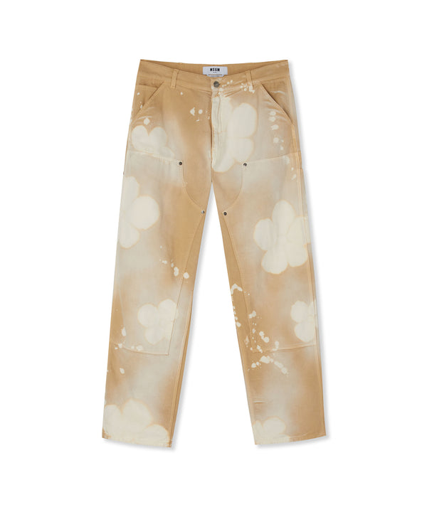 Workwear pants with tie-dye daisies