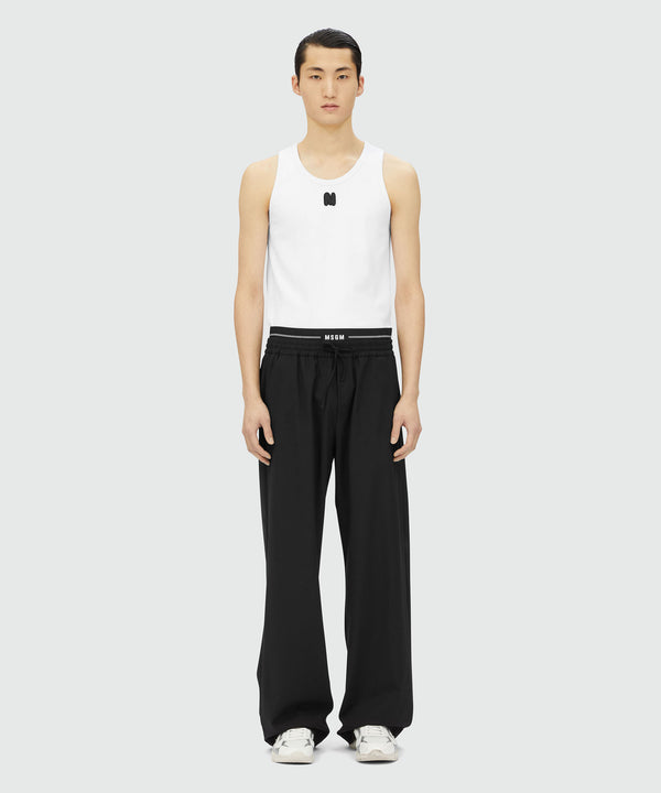 Black virgin wool pants with elastic logo
