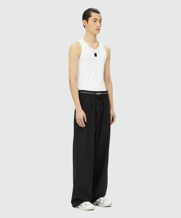 Black virgin wool pants with elastic logo
