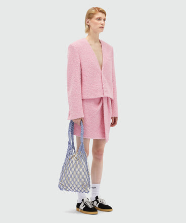 Gonna corta in tweed effetto spugna rosa