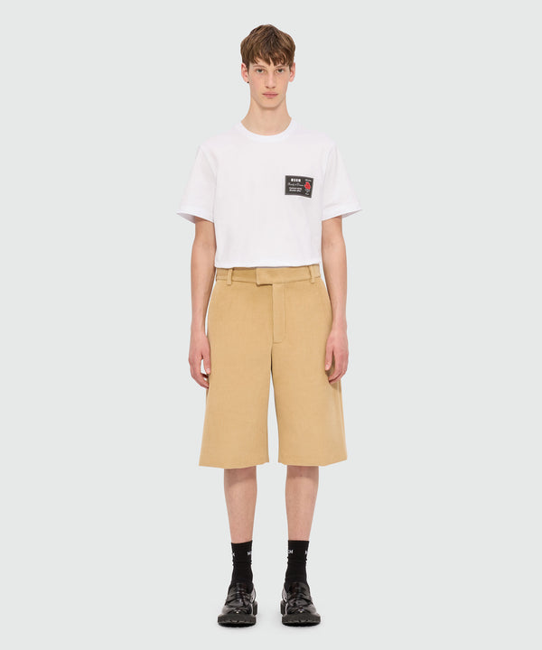 Beige Bermuda shorts in scubbated velvet