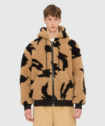 Giubbino beige in teddy con motivo "Follow the rabbit®"