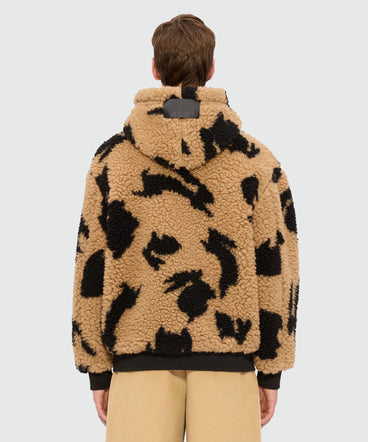 Giubbino beige in teddy con motivo "Follow the rabbit®"