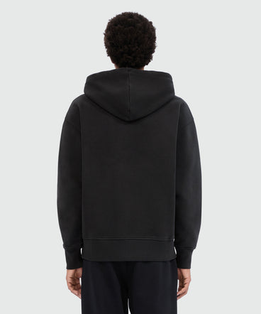 Black jersey hoodie with cursive MSGM logo