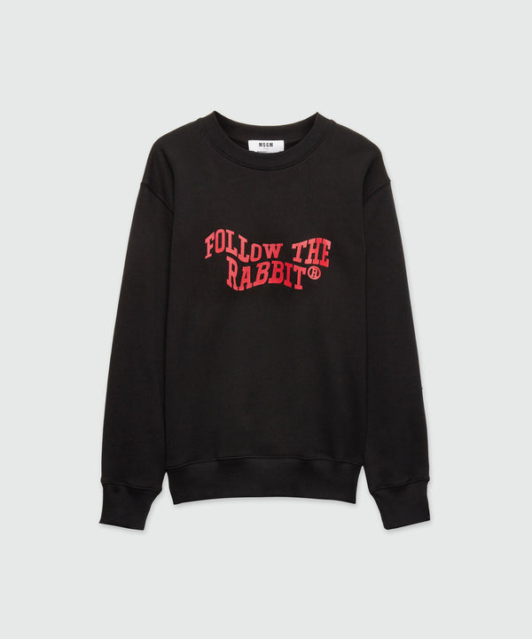 Black jersey sweatshirt with MSGM "Follow the Rabbit®" graphic