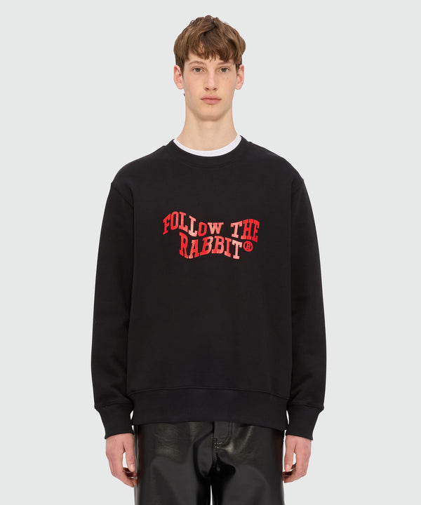 Black jersey sweatshirt with MSGM "Follow the Rabbit®" graphic