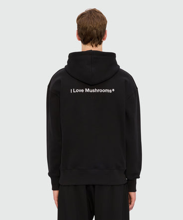 Black jersey hoodie with "I Love Mushrooms" patch and quote