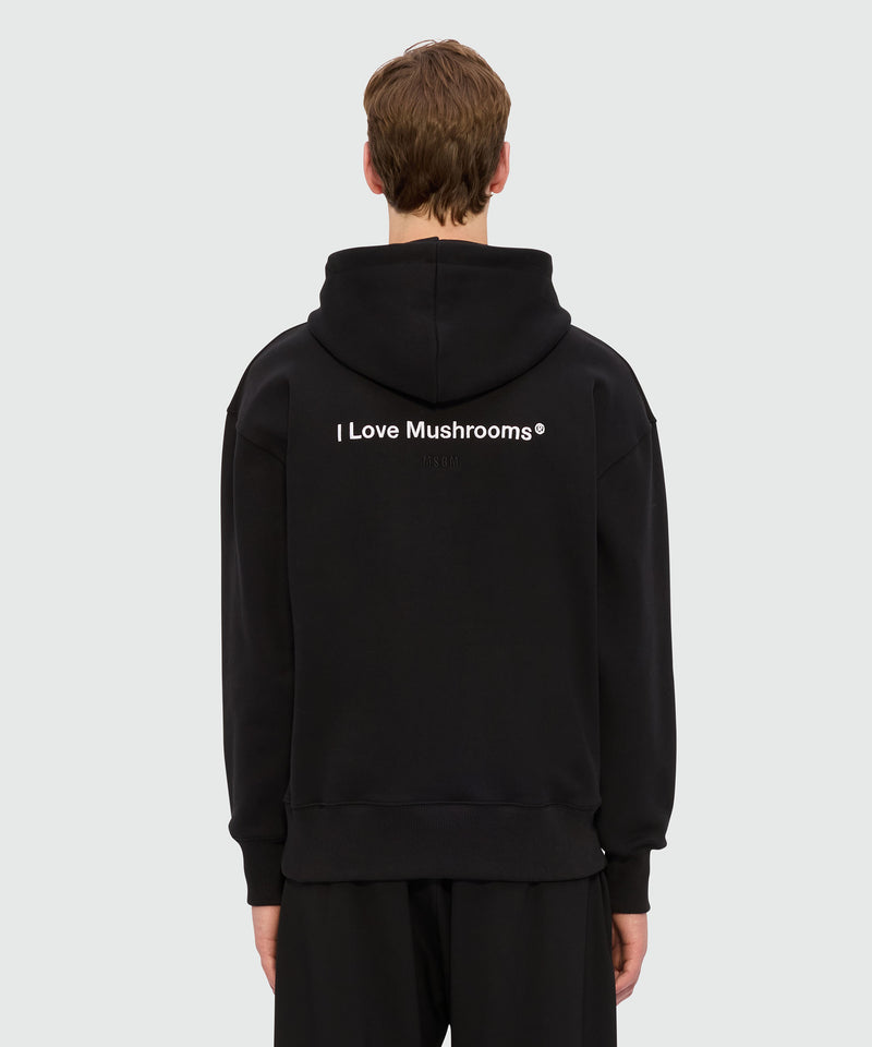 Black jersey hoodie with "I Love Mushrooms" patch and quote 99 Men 