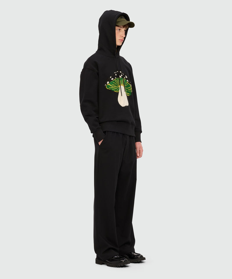Black jersey hoodie with "I Love Mushrooms" patch and quote 99 Men 