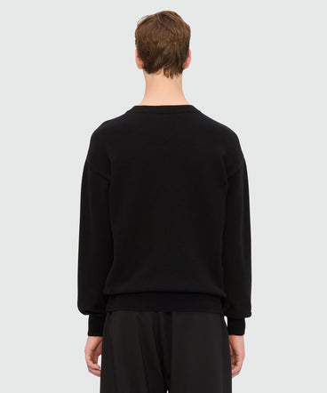 Black cashmere blend sweater with "TheMwave" patch