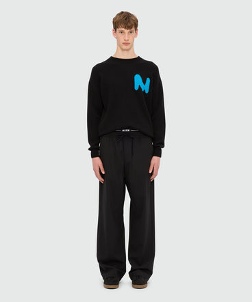 Wide black trousers in cool wool