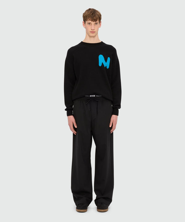 Wide black trousers in cool wool