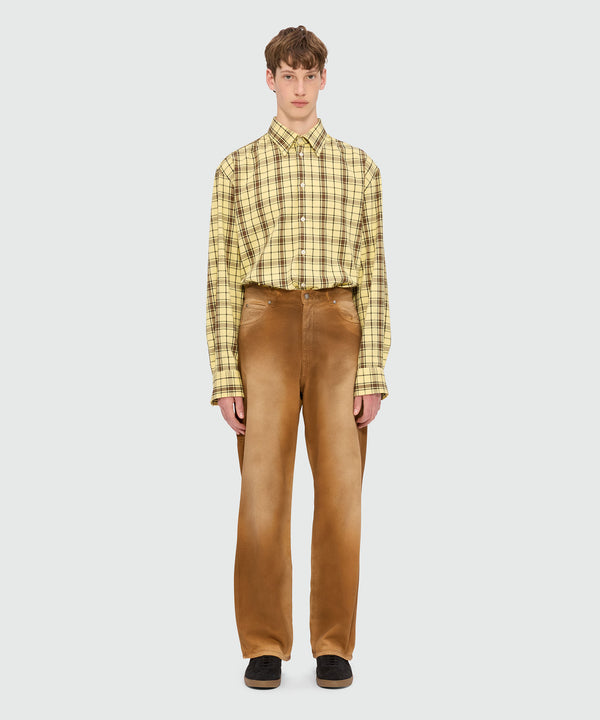 Beige spray-effect denim trousers
