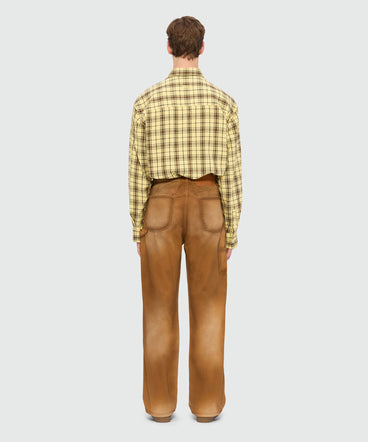 Beige spray-effect denim trousers