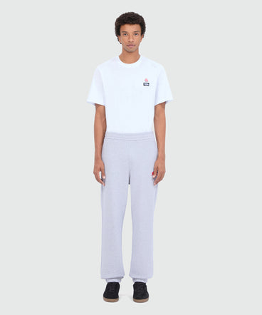 Pantaloni jogger grigio mélange con ricamo "Follow the rabbit®"