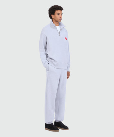 Pantaloni jogger grigio mélange con ricamo "Follow the rabbit®"