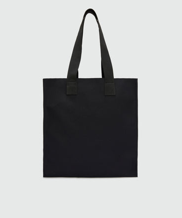 Black canvas tote with "Family Business" print