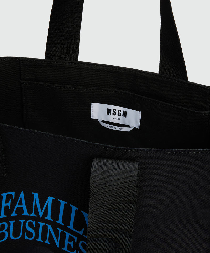 Black canvas tote with "Family Business" print 99 Men 