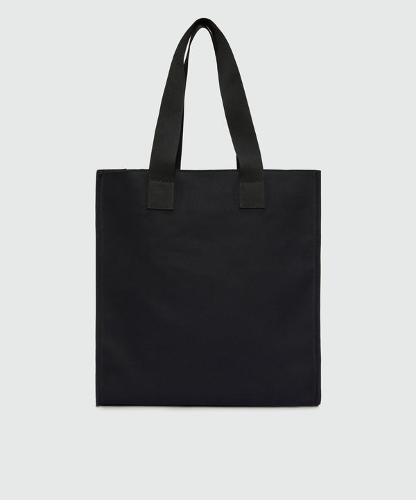 Black canvas tote with white cursive MSGM logo