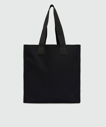 Black canvas tote with "Softcore" print