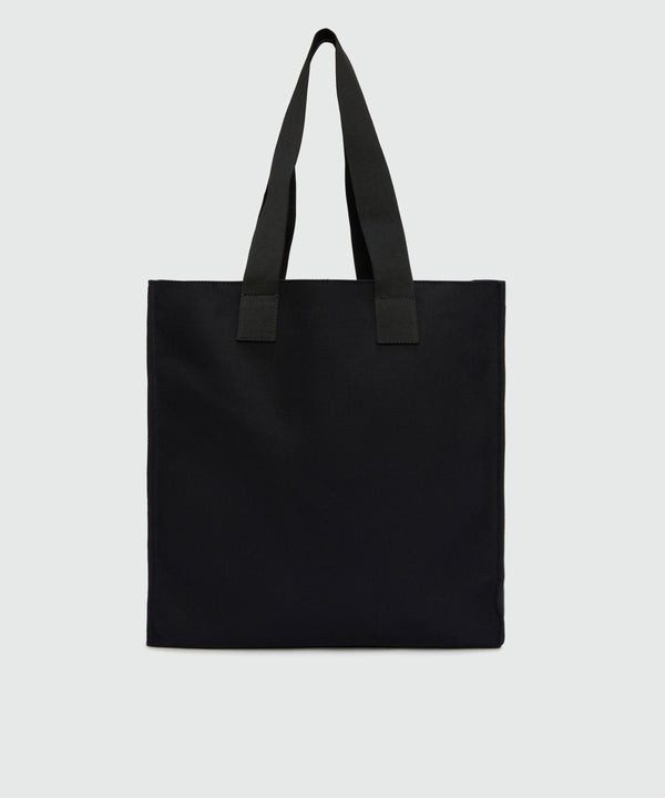 Black canvas tote with "Softcore" print