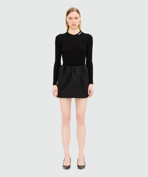 Black miniskirt in cool wool with tulle layer