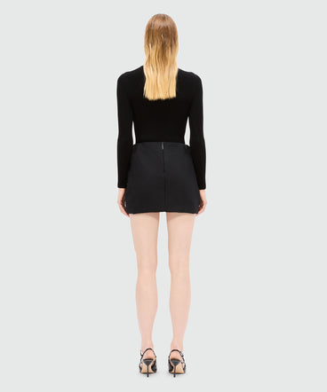 Black miniskirt in cool wool with tulle layer