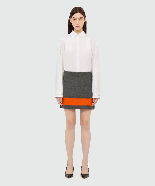 Charcoal miniskirt in wool cloth with contrasting band
