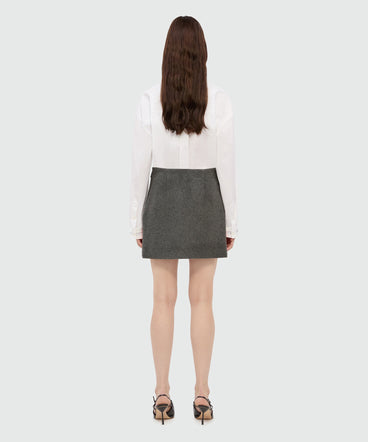 Charcoal miniskirt in wool cloth with contrasting band