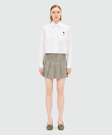 Ivory pleated miniskirt in micro check