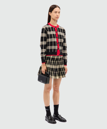 Black miniskirt in techno piquet with check pattern