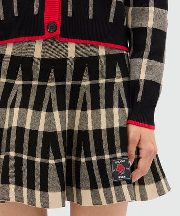 Black miniskirt in techno piquet with check pattern