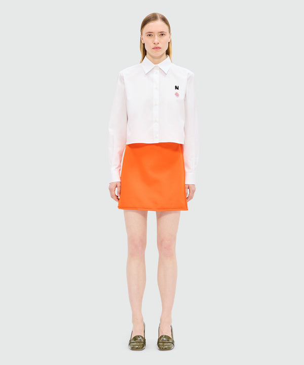 Orange cady miniskirt with "TheMwave" detail