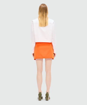Orange cady miniskirt with "TheMwave" detail