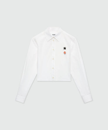 White poplin cropped shirt with "TheMwave" embroidery and pink patch