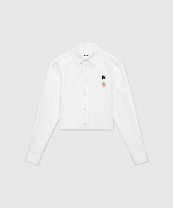 White poplin cropped shirt with "TheMwave" embroidery and pink patch