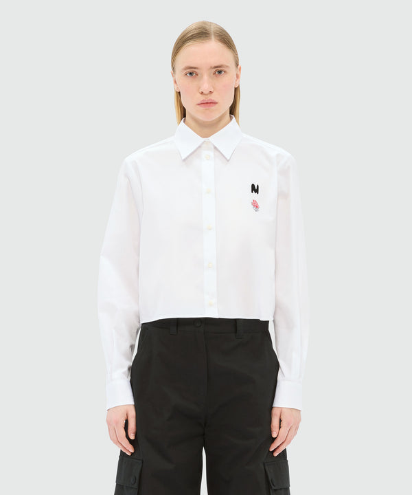 White poplin cropped shirt with "TheMwave" embroidery and pink patch