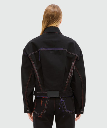 Black denim jacket with multi-colored stitching and threads