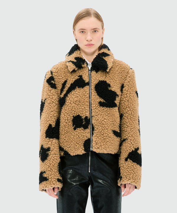 Beige teddy jacket with "Follow the Rabbit¬Æ" motif