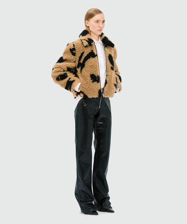 Beige teddy jacket with "Follow the Rabbit¬Æ" motif
