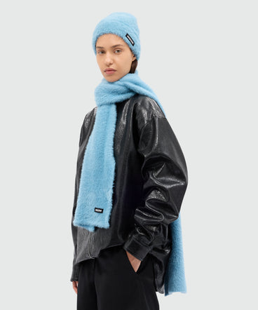 Light blue scarf with MSGM logo label